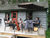 Gully Girls relaxing and playing guitar by the Coop deck